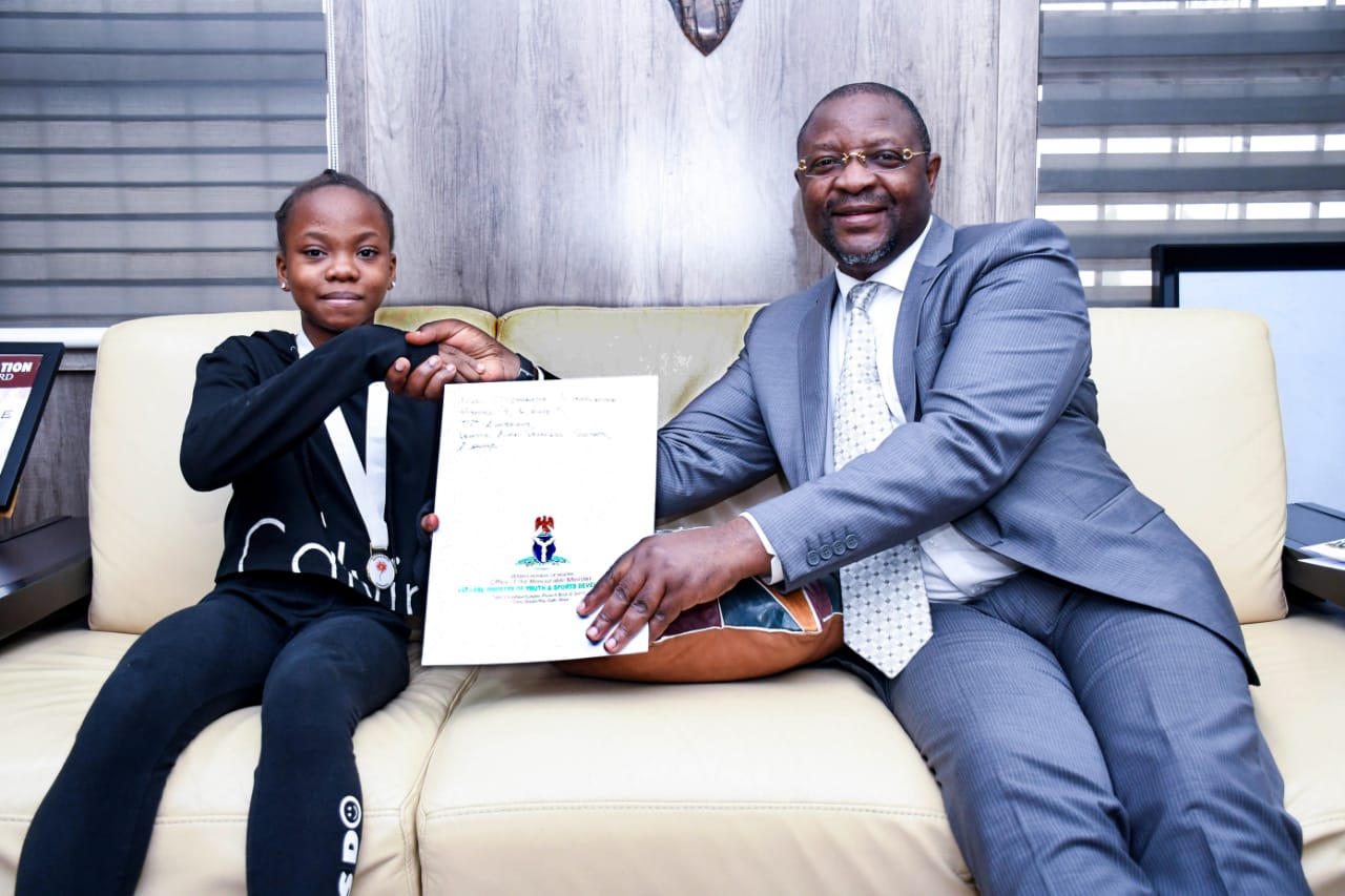 Nigeria’s Sports Minister Rewards Young Gymnast With Two Hundred and Fifty Thousand Naira.