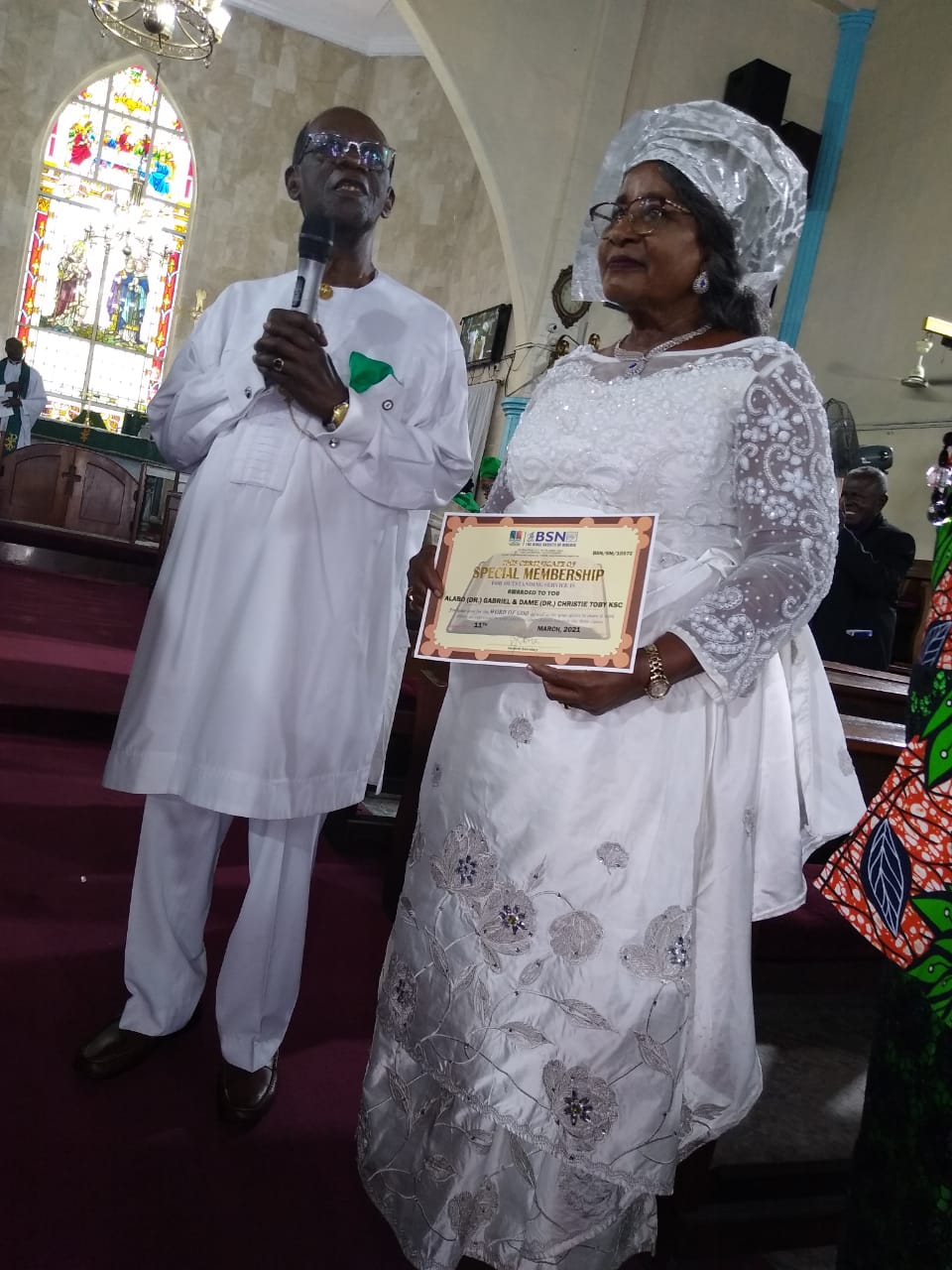 Fmr Dep Gov Toby And Wife Presented With BSN Certificate.